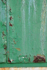 green rusty metal door