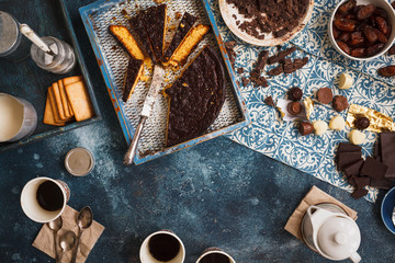 Almond tart, chocolate and coffee cups