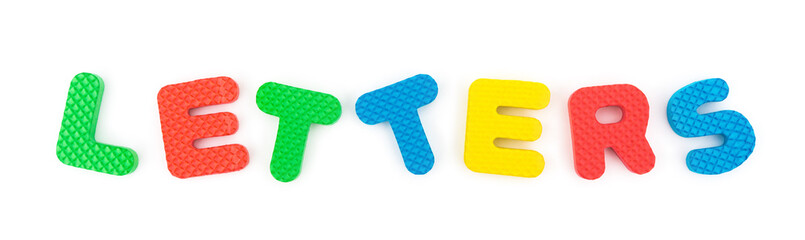 word of letters made by alphabet jigsaw puzzle on white