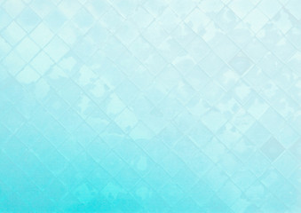 Fototapeta na wymiar Abstract glass wall pattern on gradient blue paper background