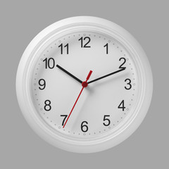 white wall clock isolated on grey background