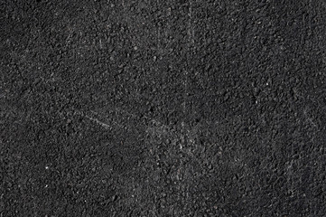 Fototapeta premium Close up of asphalt road,Black nature asphalt background,background texture of rough asphalt,macadamized texture