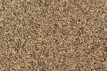 Yellow and Black Rubber Floor or Mat on playground.