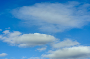 white clouds in the blue sky