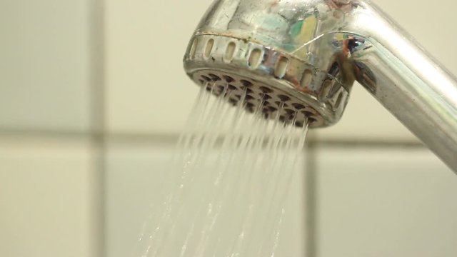 Water flows from the tainted shower