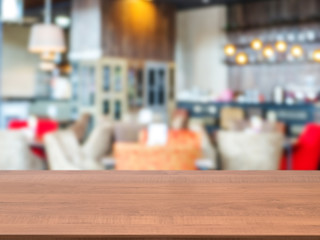 Wooden board empty table in front of blurred cafe