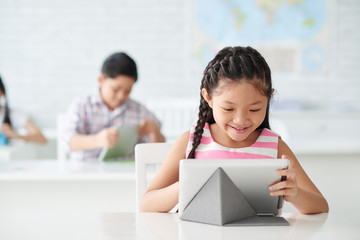 Working on tablet © DragonImages