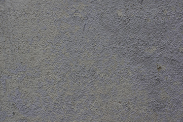 Texture from old cement weathered wall with cracks and scratches