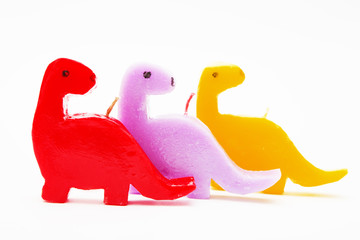 Souvenir gift candles in the shape of multicolored dragons.