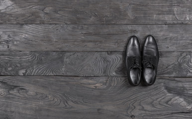 black male elegant shoes on a black background