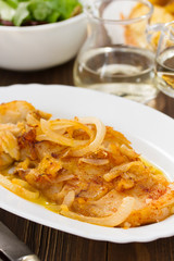 cod fish with potato on white plate