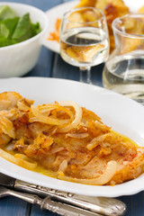 cod fish with potato on white plate