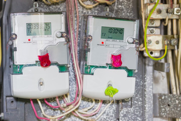 Two domestic digital electricity meter, mounted in distribution