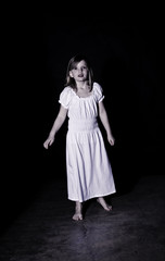 Girl wearing a white nightgown