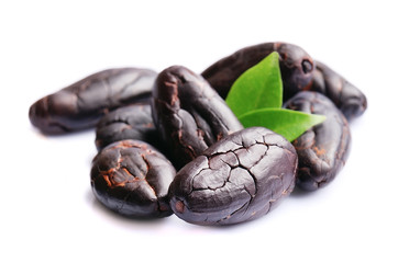 Cocoa beans with leaves