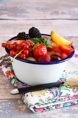 Fresh and delicious summer fruit and berries in bowl