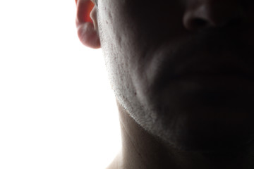Fototapeta premium Portrait of a young man in front view, half view