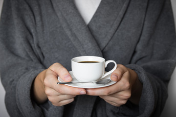 Giving a cup of coffee