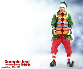 Winter time and elf with gifts 