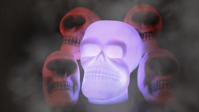 Spooky Burning Skulls, Fog Effect And Black Background