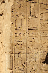 Ancient Egypt. The columns are decorated with carved hieroglyphs. Karnak Temple. Luxor. Thebes.