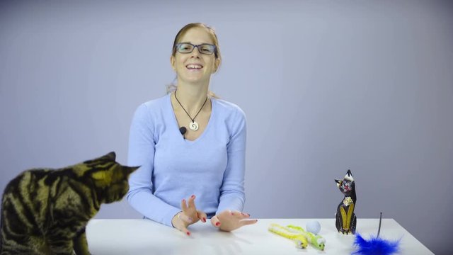 Presenter laughing in camera and continue talking 4K
