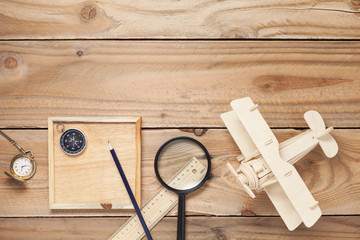 Empty coffee cups,Wood airplane, compass,pocket watch,ruler 