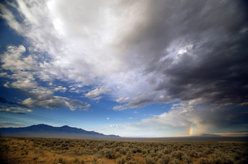clouds desert n rainbow