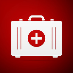 Obraz premium First aid box flat icon on red background. Vector Illustration