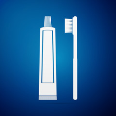 Toothbrush and toothpaste flat icon on blue background. Vector Illustration