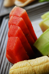 Watermelon, Banana, and Melon Sliced on a Plate.. Fresh & Healthy Breakfast with Fruit..