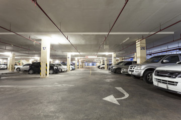 Parking garage, underground interior.