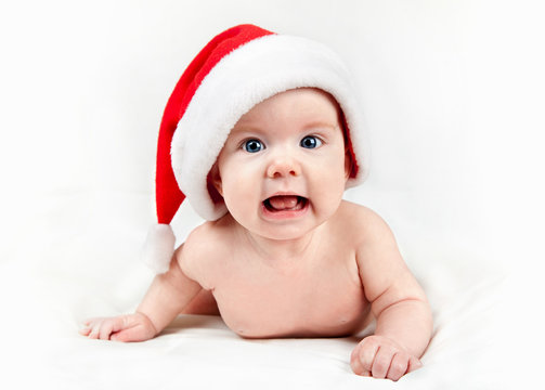 Baby in red Santa hat