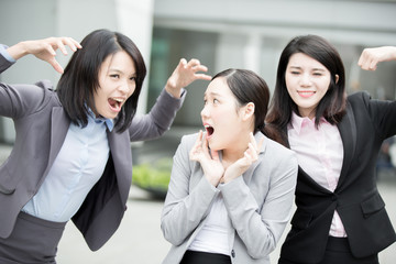 business woman bullying