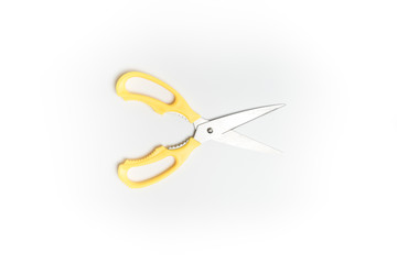 Yellow scissor isolated on white background