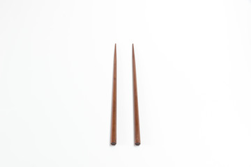 Wooden chopsticks isolated on white background
