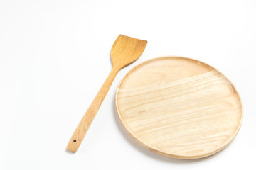 Wooden plate or tray with flipper or spade isolated on white background