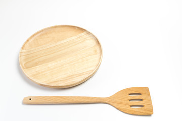 Wooden plate or tray with flipper or spade isolated on white background