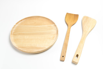 Wooden plate or tray with flipper or spade isolated on white background