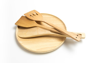 Wooden plate or tray with flipper or spade isolated on white background