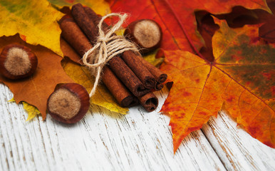 Autumn leaves with cinnamon and hazelnuts