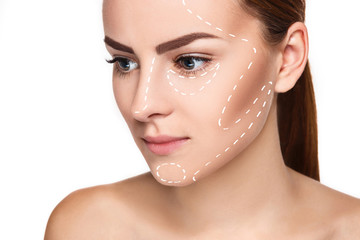 The beautiful woman face with arrows close up over white background