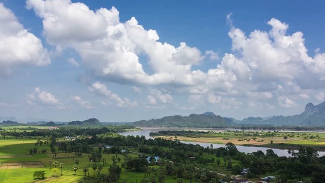 4K time-lapse of white clouds moving over beautiful rural landscape near Hpa-an, Kayin State, Myanmar