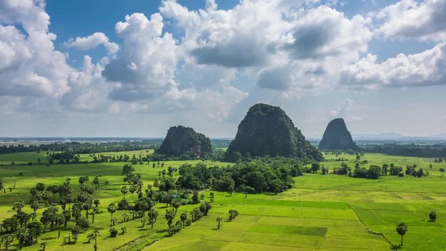 4K time-lapse of white clouds moving over beautiful rural landscape near Hpa-an, Kayin State, Myanmar