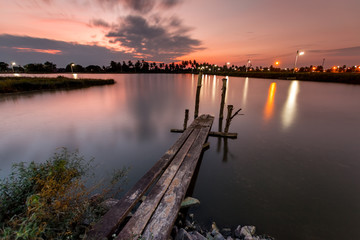 Sunset over the lake in the village.