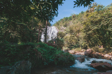 Waterfall in deep forest in national park in Thailand.