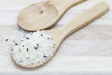 Uncooked Thai rice in ladle rice Healthy Food.