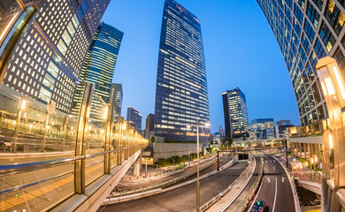 Tokyo skyscrapers in Shimbashi, skyward sunset view