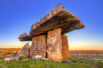 Poulnabrone portal tomb in Burren at sunrise, Ireland