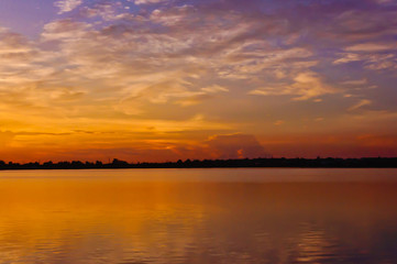 Fototapeta na wymiar View of sun rise at near lake.